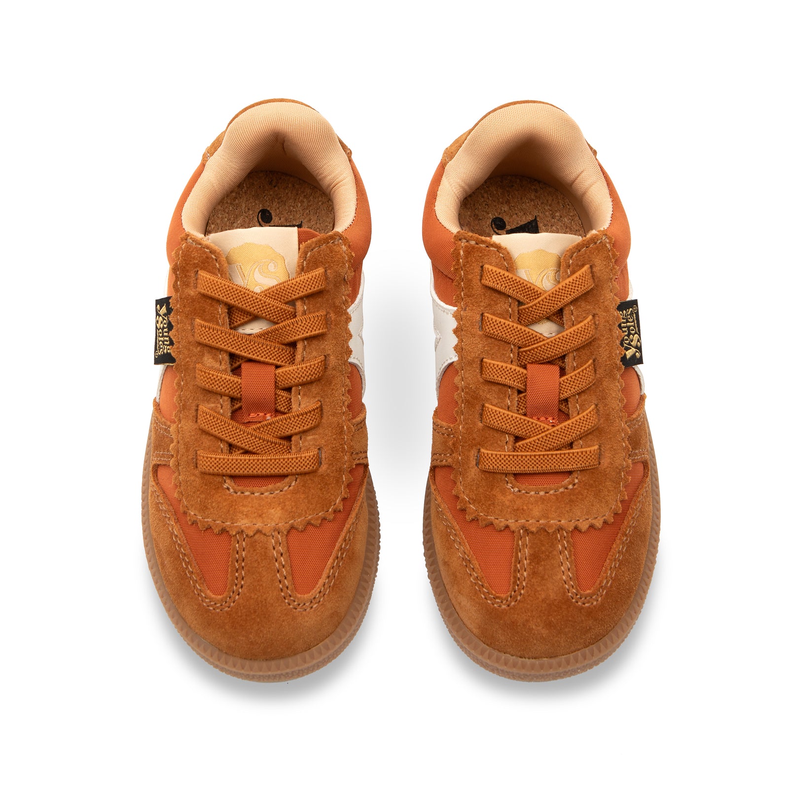 Pair of Brooking orange children's sneakers with white accents on a white background
